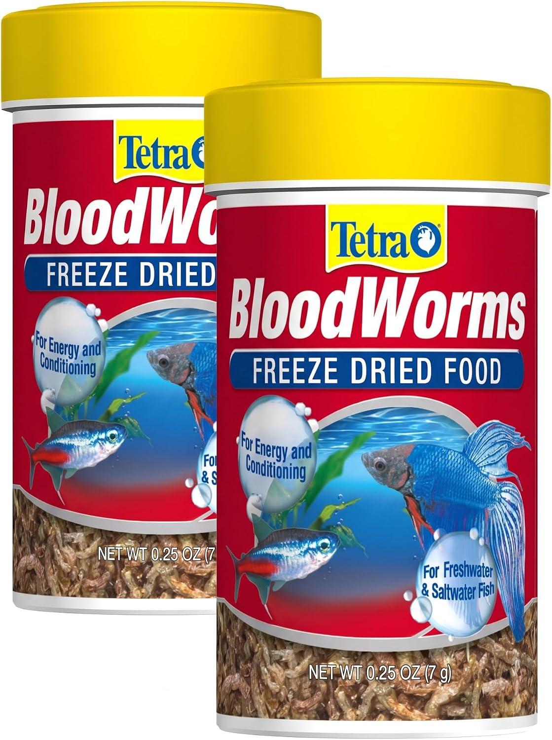 Container of freeze-dried natural bloodworms treat food for tropical fish.