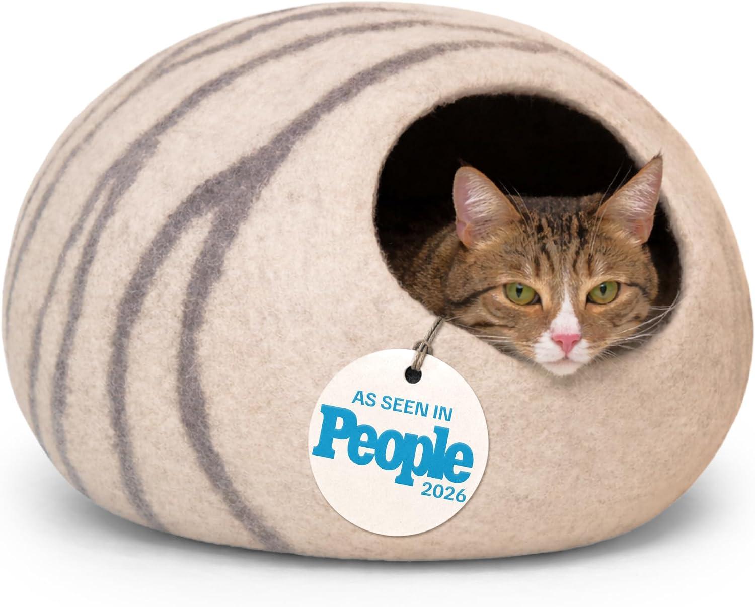 Natural wool felted cocoon cat cave bed in soft heather grey.