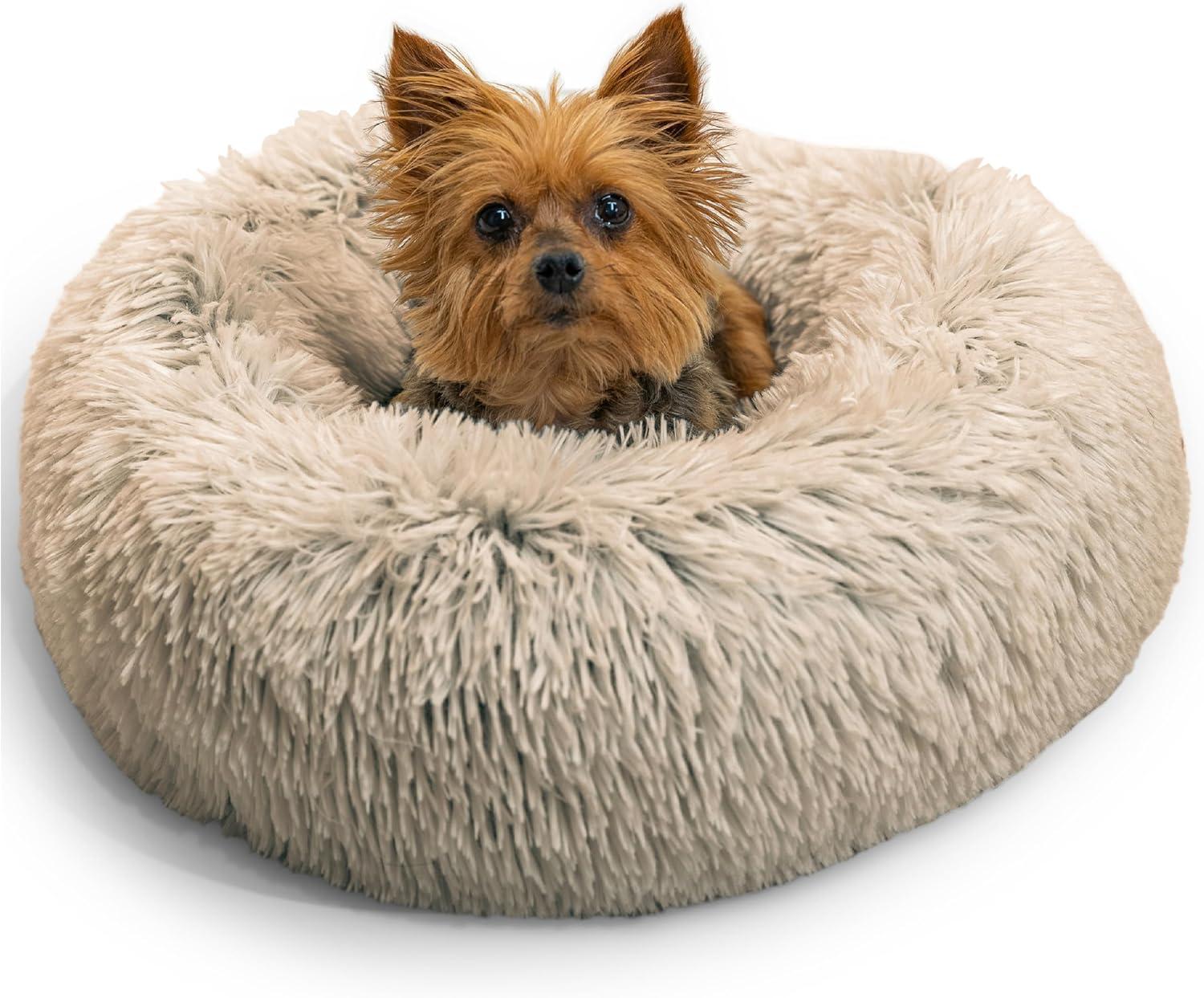 Round plush faux fur shag donut pet bed with deep headrest rim.