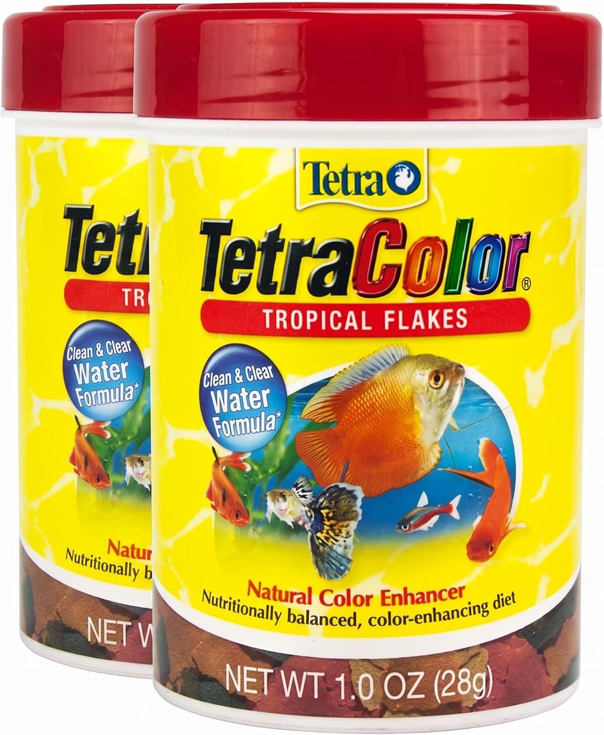 Canister of colorful high-protein tropical fish flakes with spirulina.